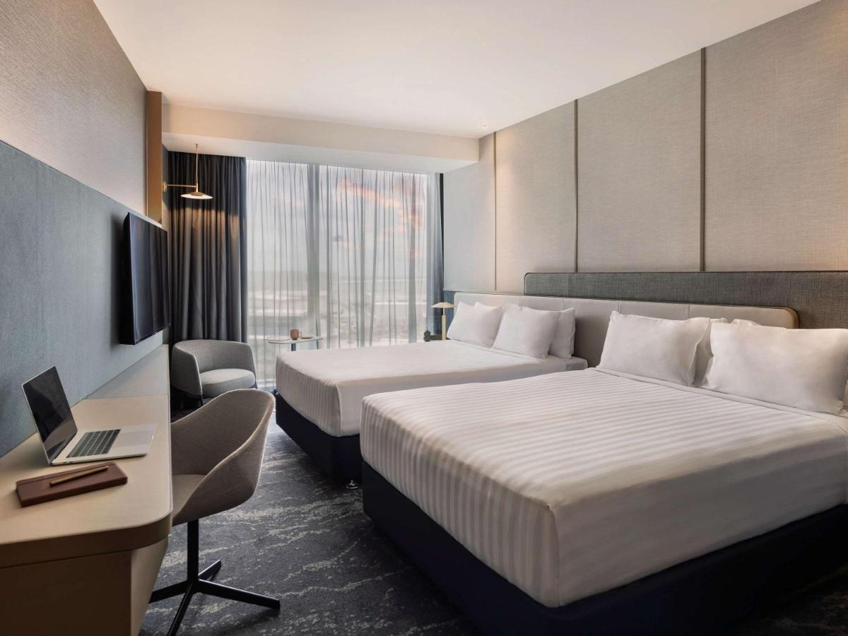 Pullman Auckland Airport Hotel Bagian luar foto Deluxe Room