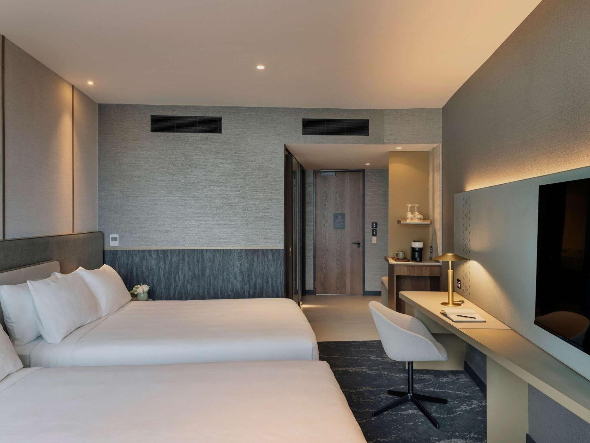 Pullman Auckland Airport Hotel Bagian luar foto Deluxe Room